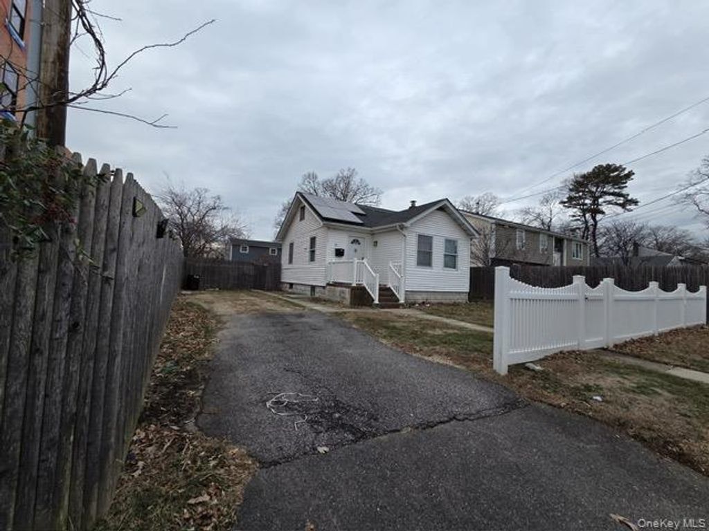 Photo of 10 N 15th Street, Wyandanch, NY 11798 (MLS # 944004)