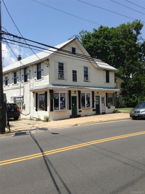 Photo of 239 Glen Cove Avenue, Sea Cliff, NY 11579 (MLS # 1047220)