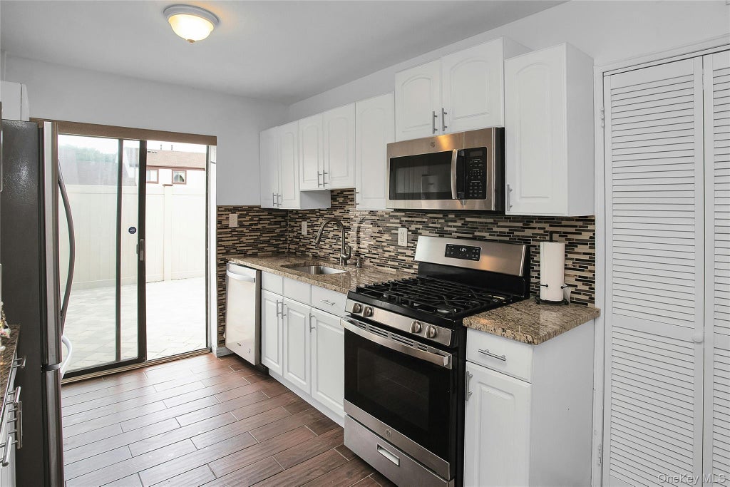 Photo of 94 Gauguin Court #94, Middle Island, NY 11953 (MLS # 1058597)