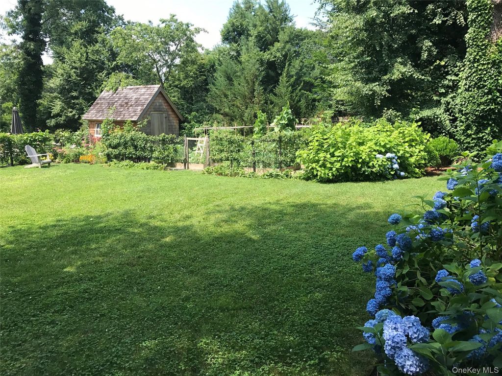 Photo of 36 S Howells Point Road, Bellport Village, NY 11713 (MLS # 975819)