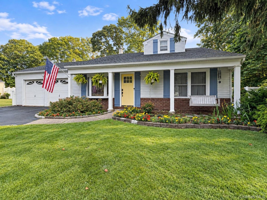 Photo of 9 Sugarbush Lane, Coram, NY 11727 (MLS # 1048076)