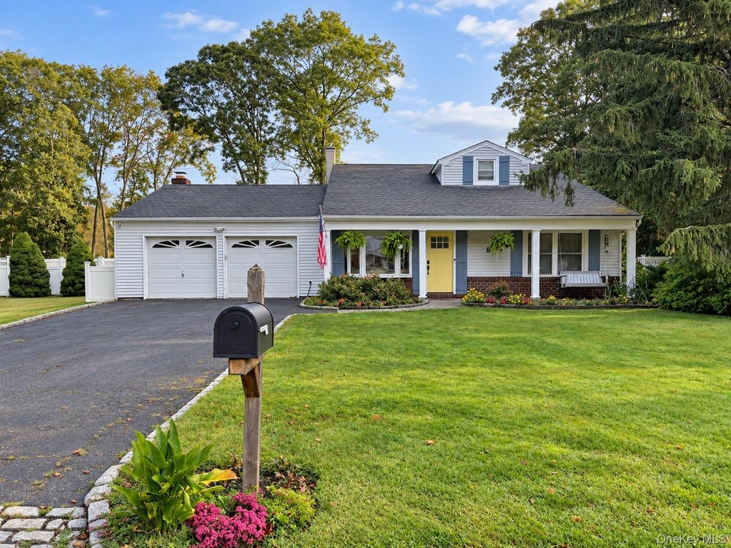 Photo of 9 Sugarbush Lane, Coram, NY 11727 (MLS # 1048076)