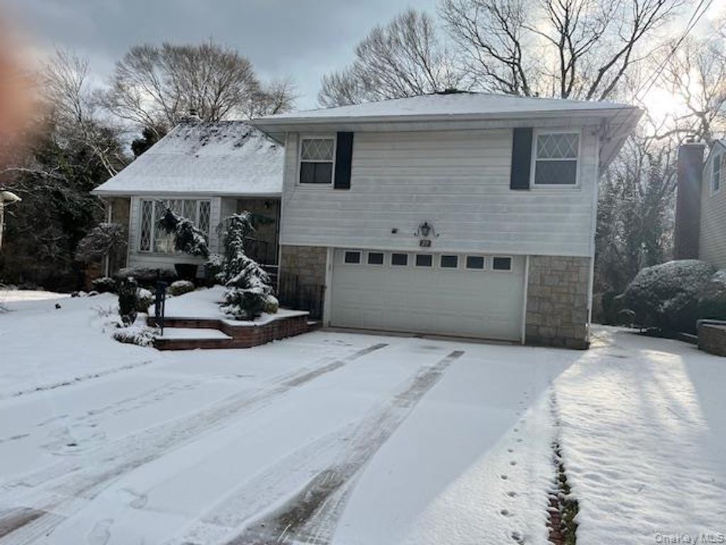 Photo of 27 Wilbur Lane, Roosevelt, NY 11575 (MLS # 944527)