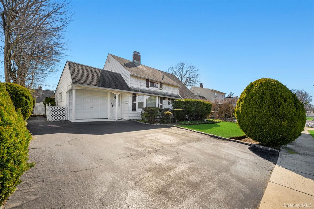 Photo of 60 Flamingo Road, Levittown, NY 11756 (MLS # 977430)