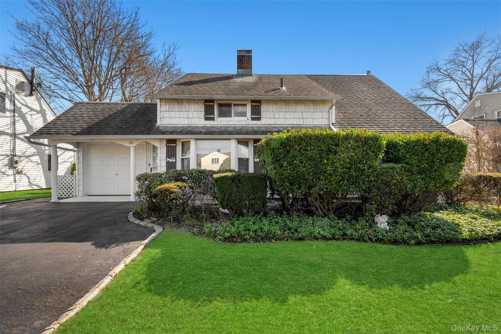 Photo of 60 Flamingo Road, Levittown, NY 11756 (MLS # 977430)