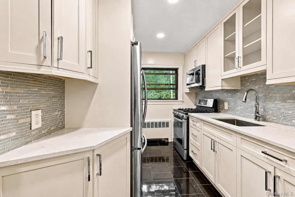 Photo of 73-02 Springfield Boulevard #2nd Fl, Bayside, NY 11364 (MLS # 1054189)
