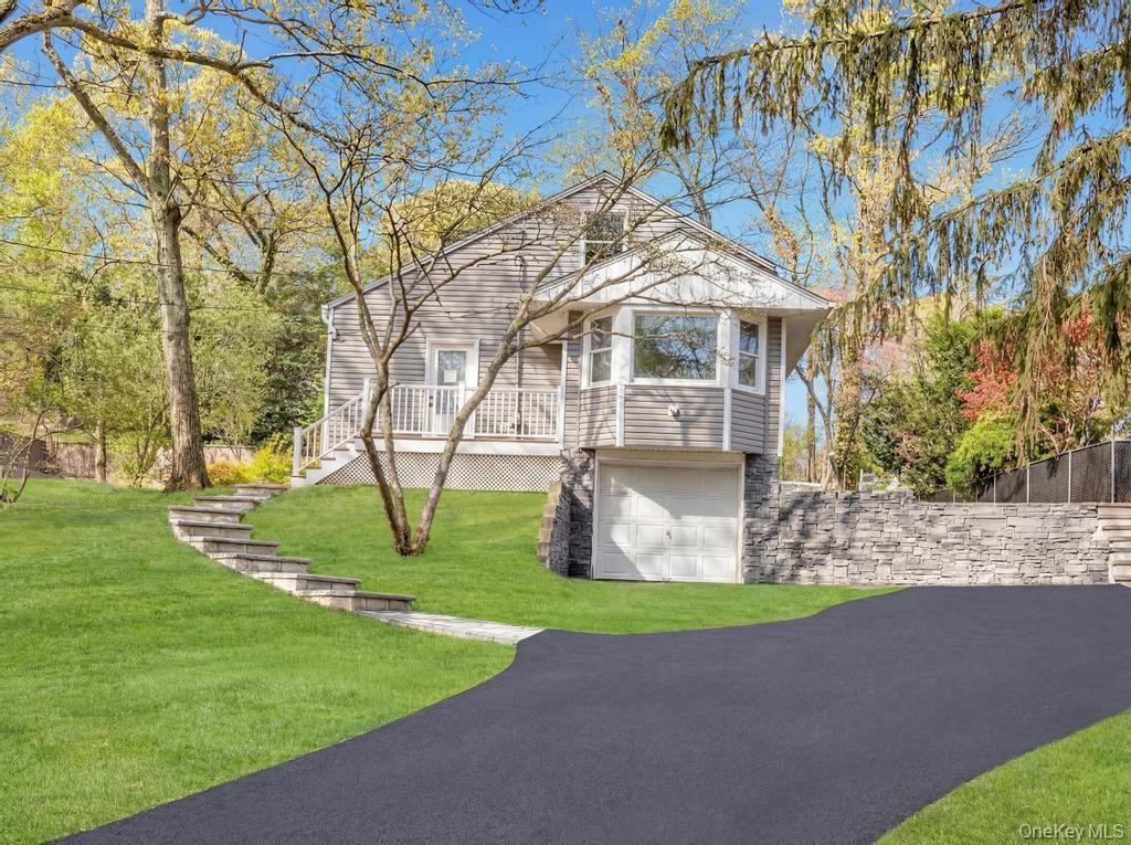 Photo of 14 Woodvale Avenue, Kings Park, NY 11754 (MLS # 988381)