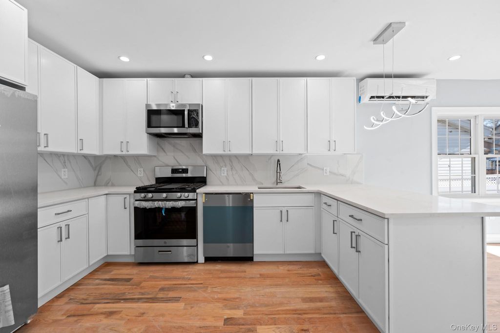 Photo of 11437 208th Street, Cambria Heights, NY 11411 (MLS # 985066)