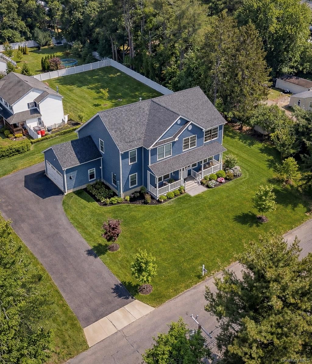 Photo of 85 N Howell Avenue, Centereach, NY 11720 (MLS # 965211)