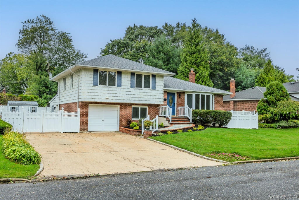 Photo of 27 Schoenfield Lane, Melville, NY 11747 (MLS # 1055388)