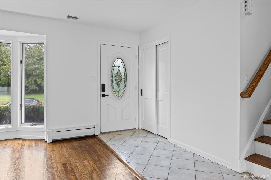 Photo of 27 Schoenfield Lane, Melville, NY 11747 (MLS # 1055388)