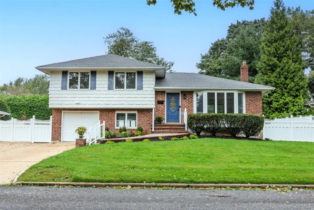 Photo of 27 Schoenfield Lane, Melville, NY 11747 (MLS # 1055388)