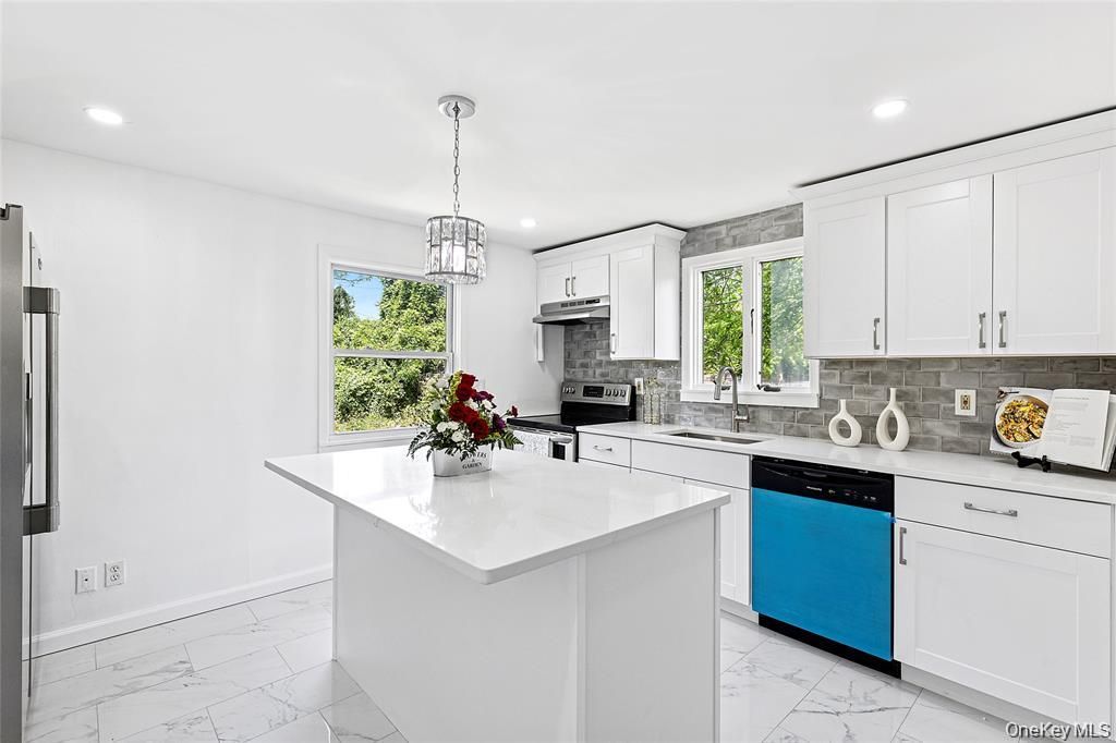 Photo of 46 Saint George Drive, Shirley, NY 11967 (MLS # 942597)