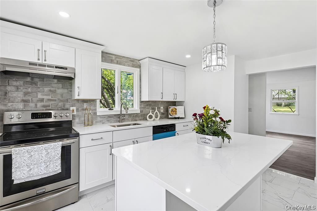 Photo of 46 Saint George Drive, Shirley, NY 11967 (MLS # 942597)