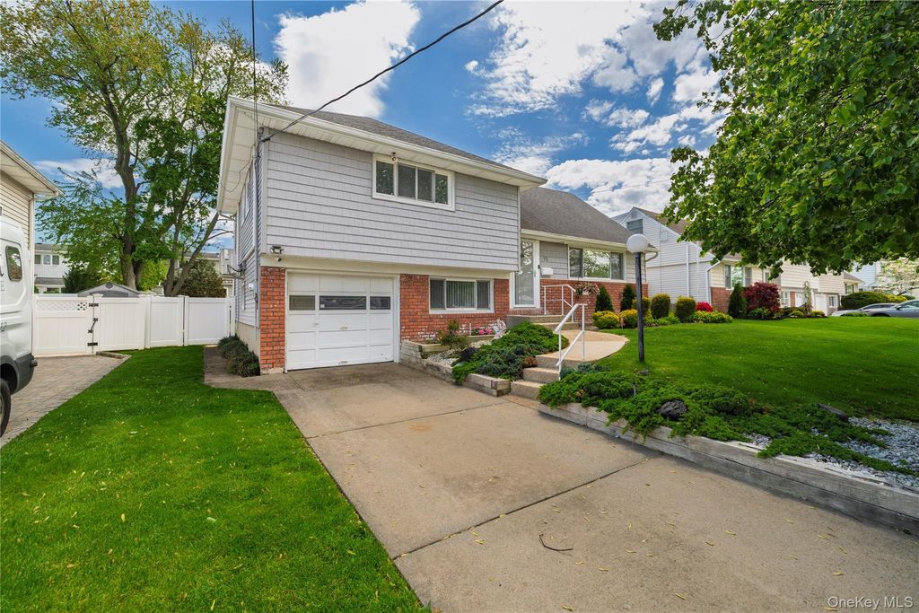 Photo of 73 Virginia Avenue, Oceanside, NY 11572 (MLS # 999738)