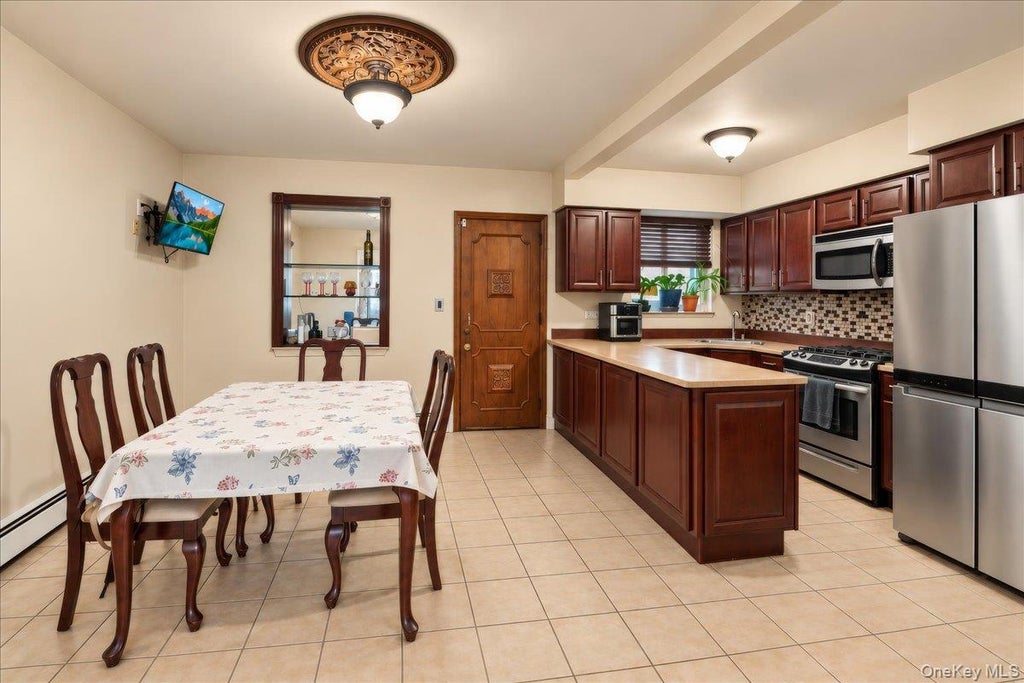 Photo of 1850 Radcliff Avenue, Bronx, NY 10462 (MLS # 1058223)