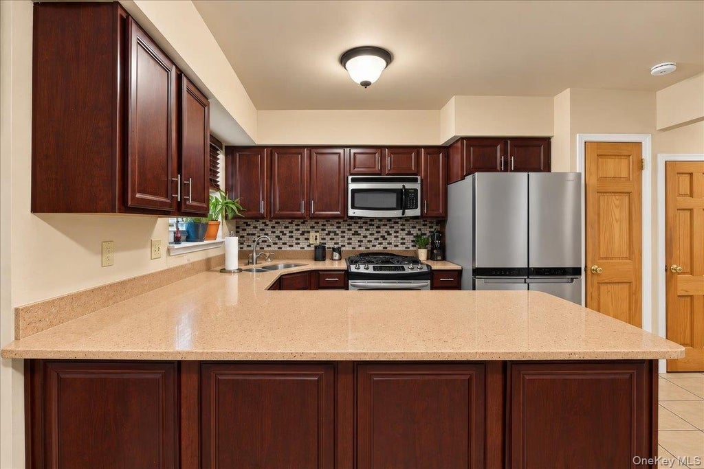 Photo of 1850 Radcliff Avenue, Bronx, NY 10462 (MLS # 1058223)