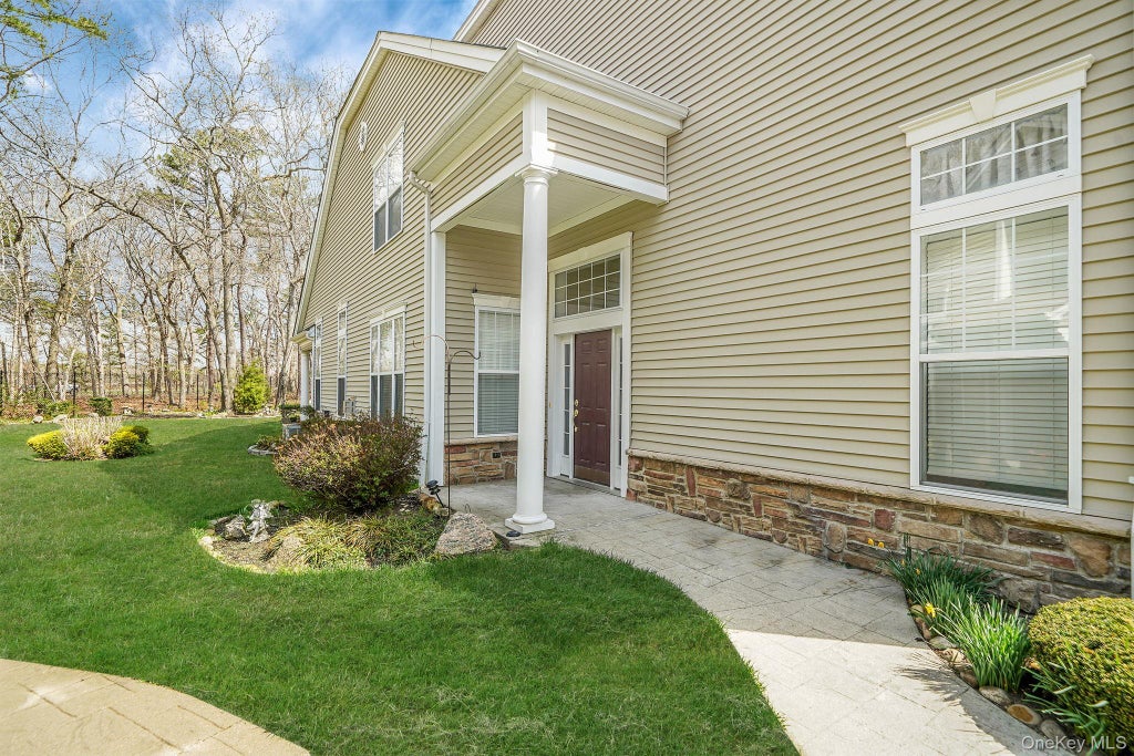 Photo of 11 Ovation Place, Eastport, NY 11941 (MLS # 1018820)