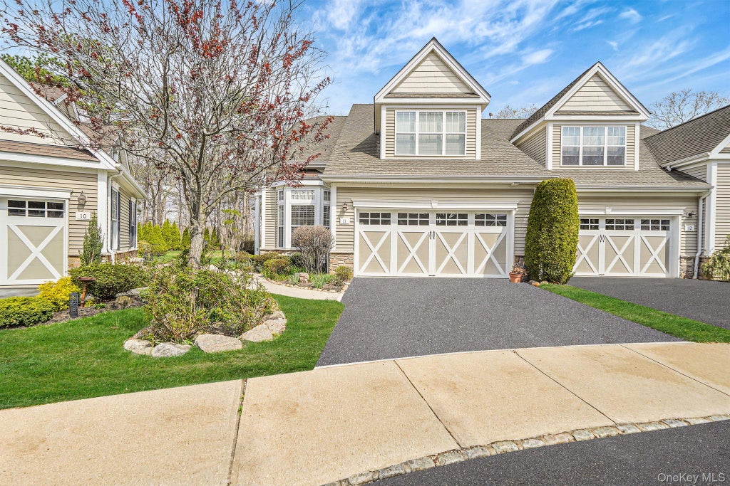 Photo of 11 Ovation Place, Eastport, NY 11941 (MLS # 1018820)