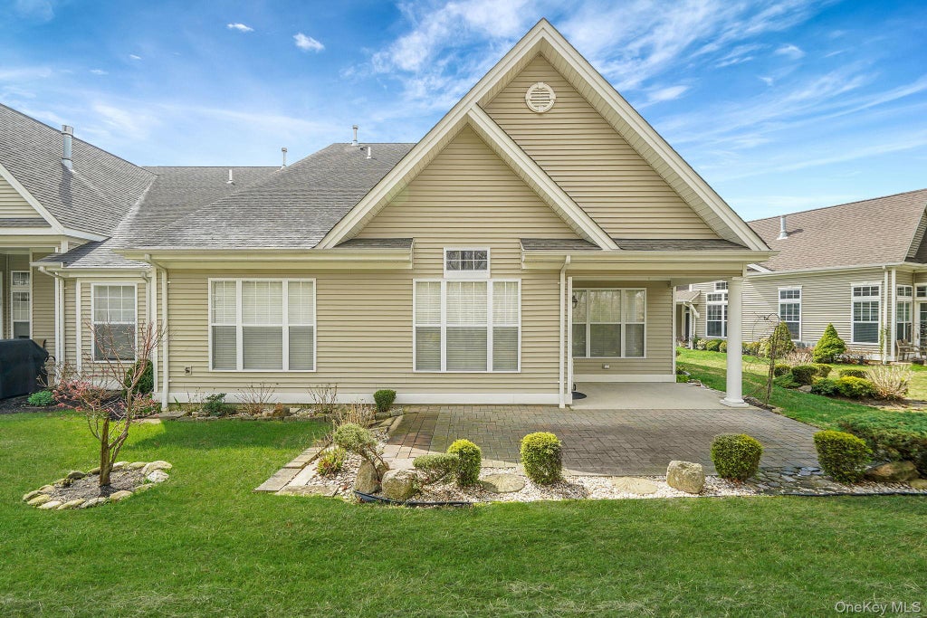 Photo of 11 Ovation Place, Eastport, NY 11941 (MLS # 1018820)