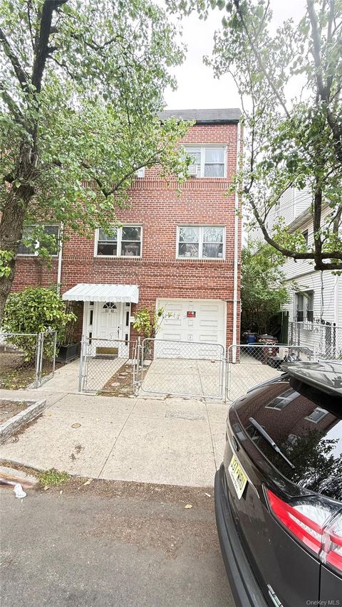 Photo of 9208 43rd Avenue, Elmhurst, NY 11373 (MLS # 997849)