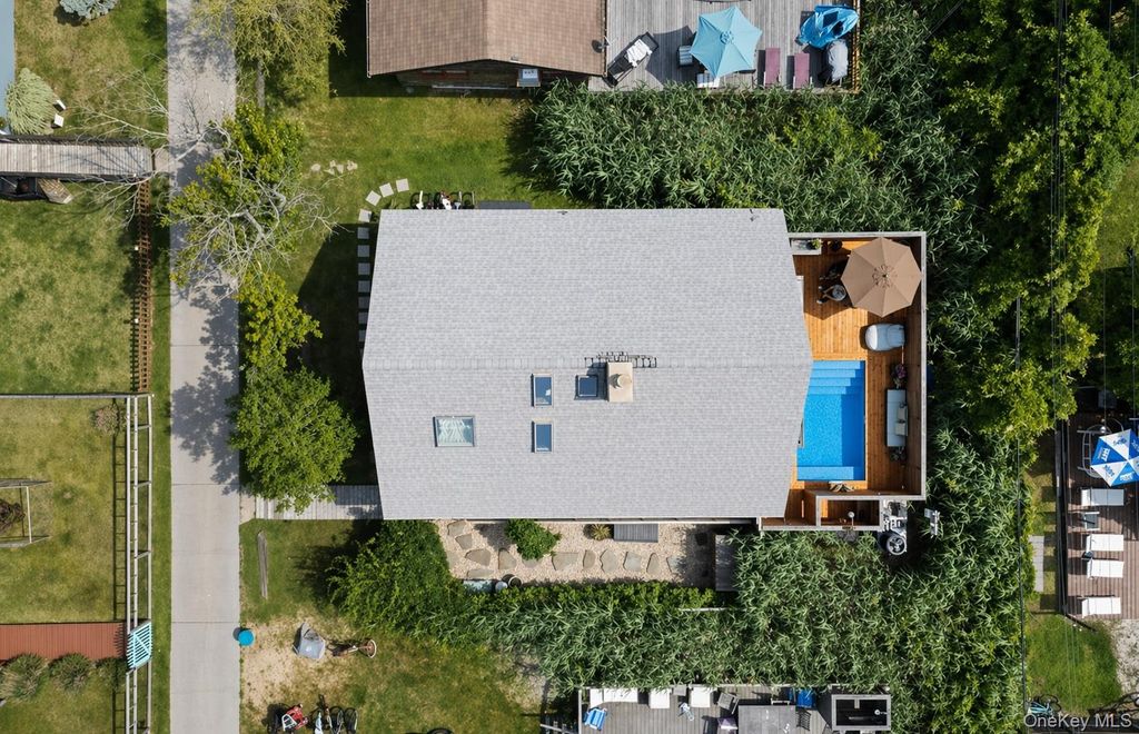 Photo of 17 Bungalow Walk, Ocean Beach, NY 11770 (MLS # 986562)