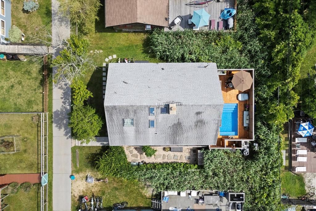 Photo of 17 Bungalow Walk, Ocean Beach, NY 11770 (MLS # 986562)