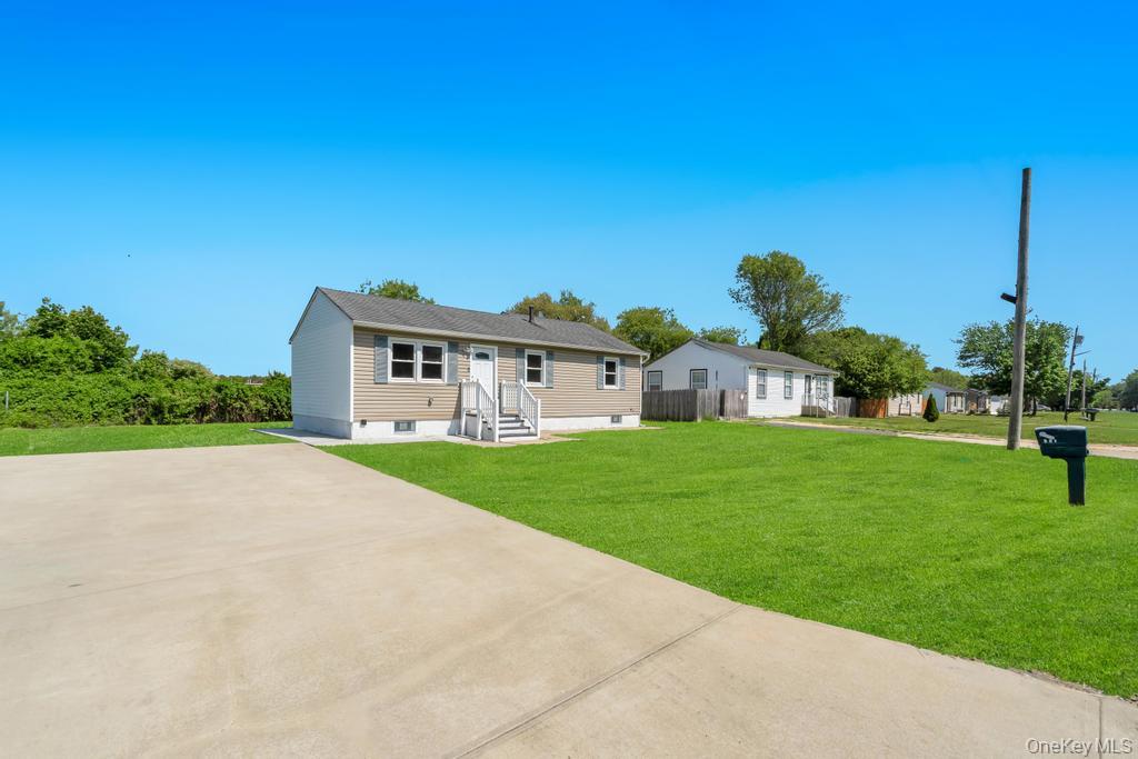 Photo of 941 Provost Avenue, Bellport, NY 11713 (MLS # 1028556)
