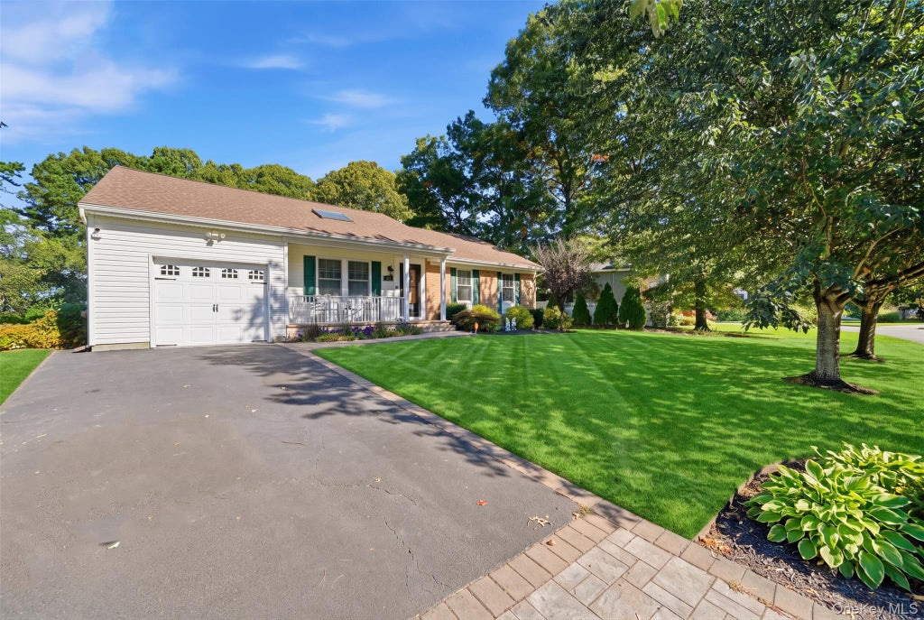 Photo of 50 Timber Ridge Drive, Coram, NY 11727 (MLS # 1060138)