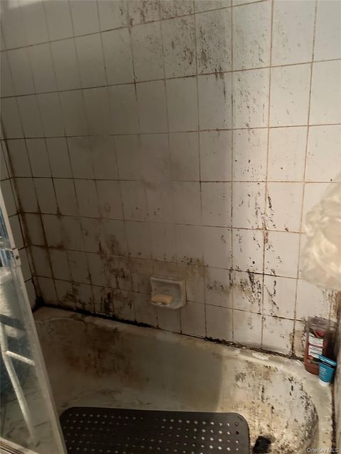 Photo of 11 Taurgo Lane, Centereach, NY 11720 (MLS # 951933)