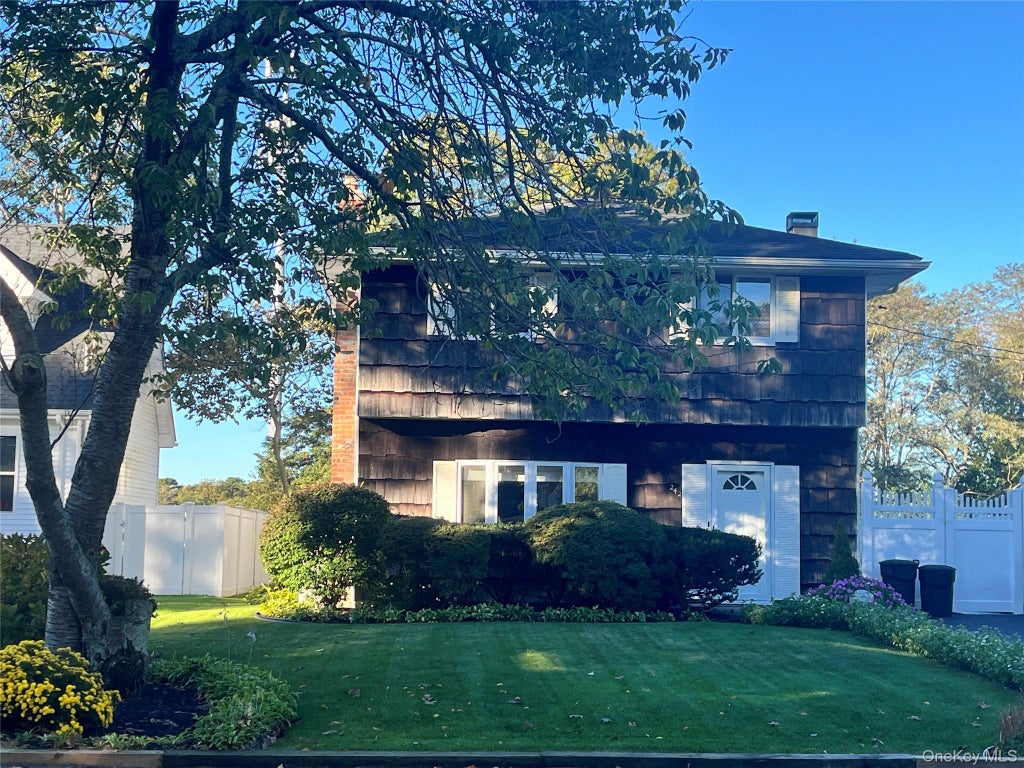 Photo of 242 Madison Street, Mastic Beach, NY 11951 (MLS # 1062764)