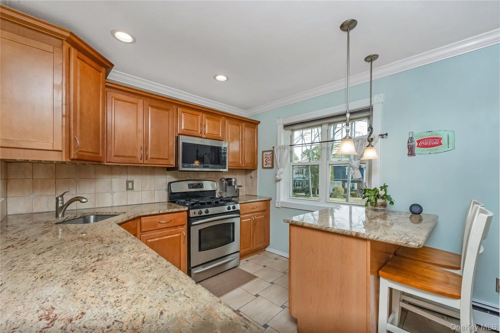 Photo of 10 Glen Hollow Road #C7, Holtsville, NY 11742 (MLS # 976446)