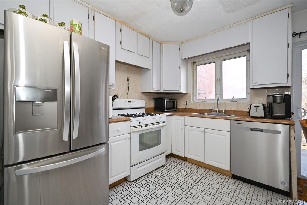 Photo of 40-29 216th Street, Bayside, NY 11361 (MLS # 942603)