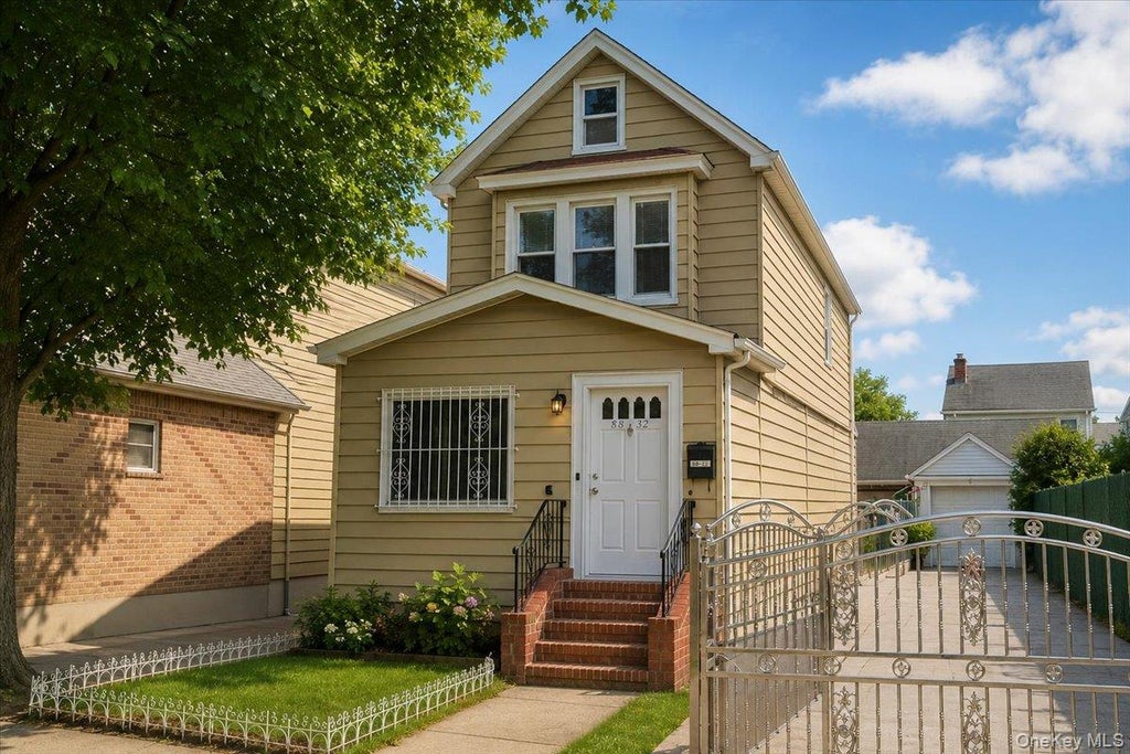 Photo of 88-32 187th Place, Hollis, NY 11423 (MLS # 1033080)