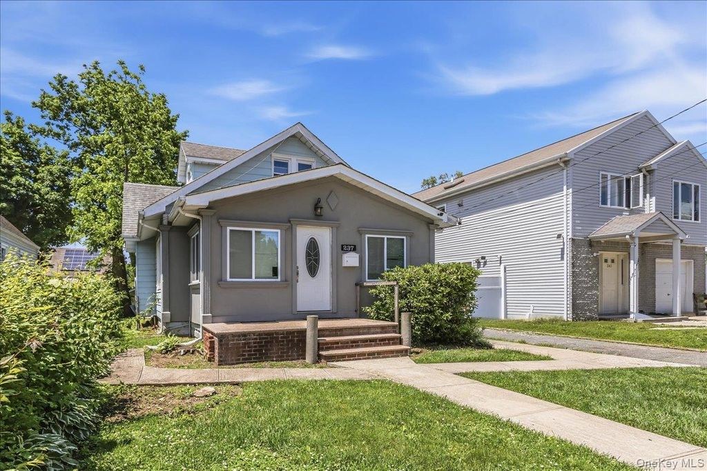 Photo of 237 Rhodes Avenue, Hempstead, NY 11550 (MLS # 1001386)