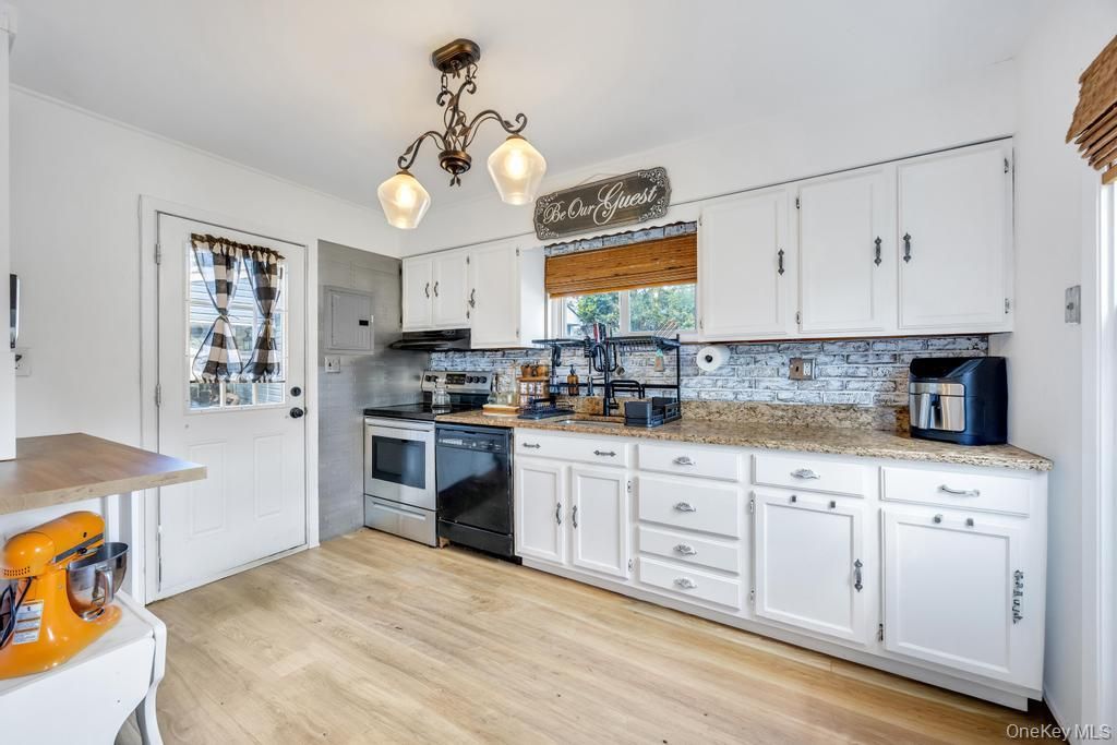 Photo of 8 Lilac Lane, Levittown, NY 11756 (MLS # 1006932)