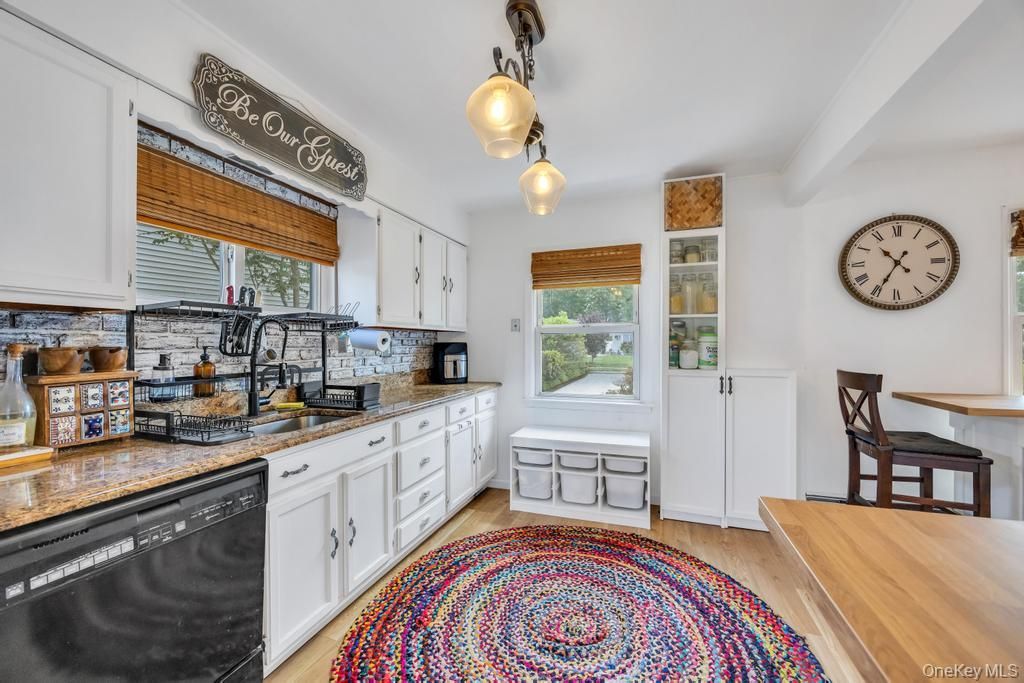 Photo of 8 Lilac Lane, Levittown, NY 11756 (MLS # 1006932)