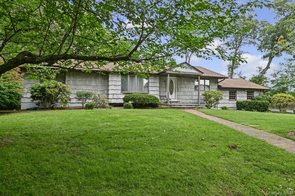 Photo of 3 Alamo Drive, Farmingville, NY 11738 (MLS # 1058567)