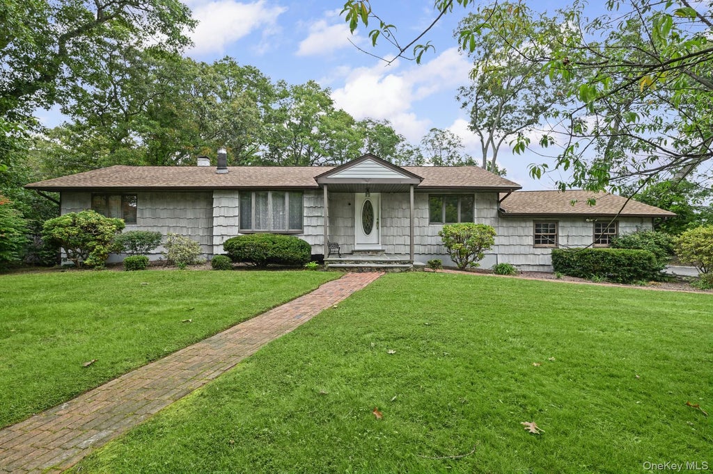 Photo of 3 Alamo Drive, Farmingville, NY 11738 (MLS # 1058567)