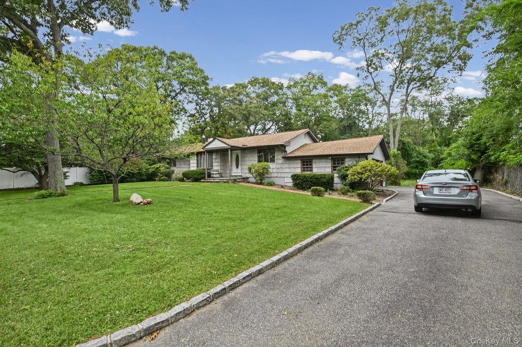 Photo of 3 Alamo Drive, Farmingville, NY 11738 (MLS # 1058567)