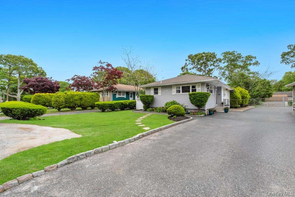 Photo of 90 Pinewood Drive, Shirley, NY 11967 (MLS # 1017294)