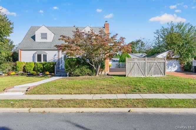 Photo of 484 Croyden Road, Garden City South, NY 11530 (MLS # 1062391)