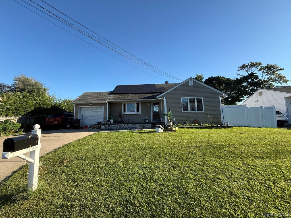 Photo of 14 Harrison Street, Brentwood, NY 11717 (MLS # 1050145)