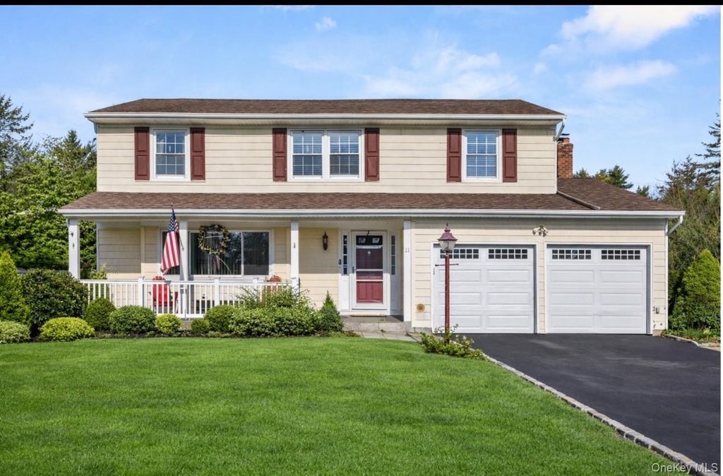 Photo of 11 Marlboro Lane, East Islip, NY 11730 (MLS # 941666)