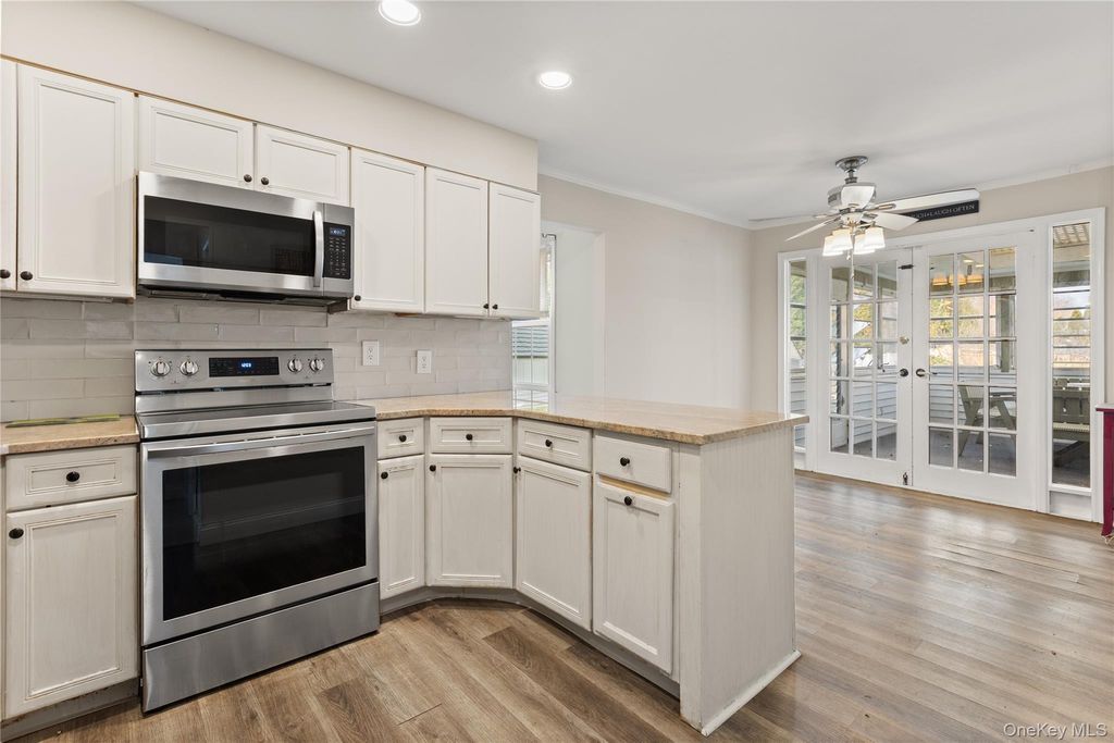 Photo of 11 Marlboro Lane, East Islip, NY 11730 (MLS # 941666)