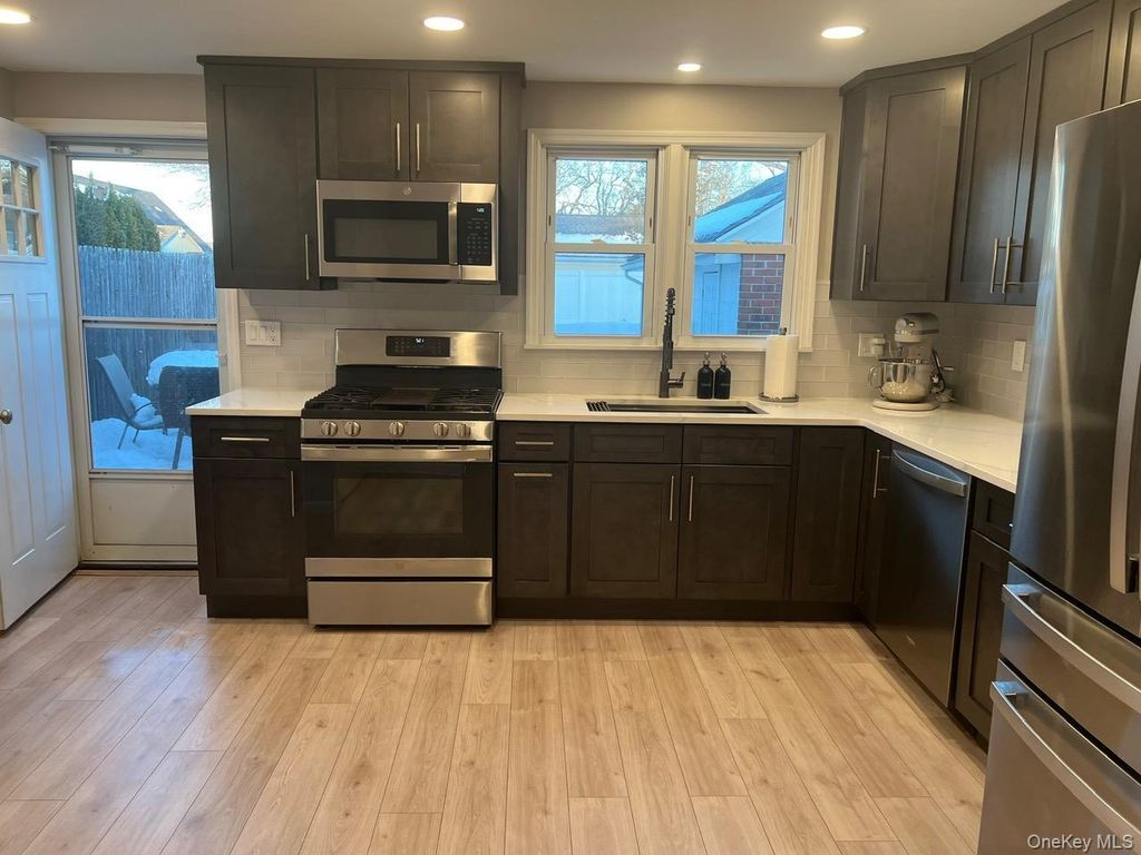 Photo of 25 Wood Avenue, Patchogue, NY 11772 (MLS # 965773)