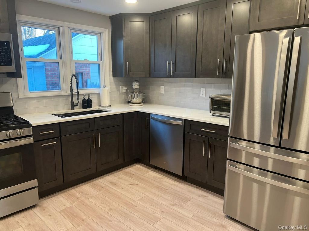 Photo of 25 Wood Avenue, Patchogue, NY 11772 (MLS # 965773)