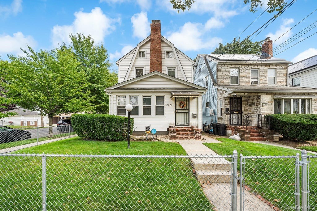 Photo of 11301 200th Street, Saint Albans, NY 11412 (MLS # 1048969)