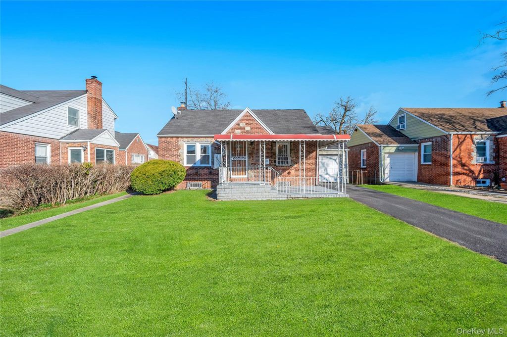 Photo of 120-11 218th Street, Cambria Heights, NY 11411 (MLS # 978061)