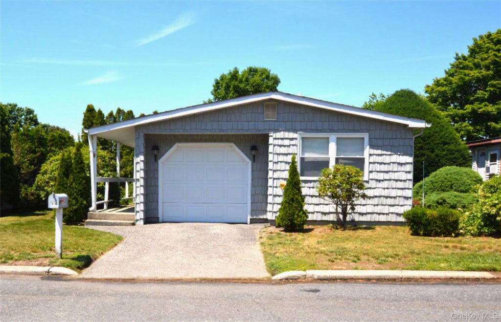 Photo of 36 Village CIR E, Manorville, NY 11949 (MLS # 1016216)